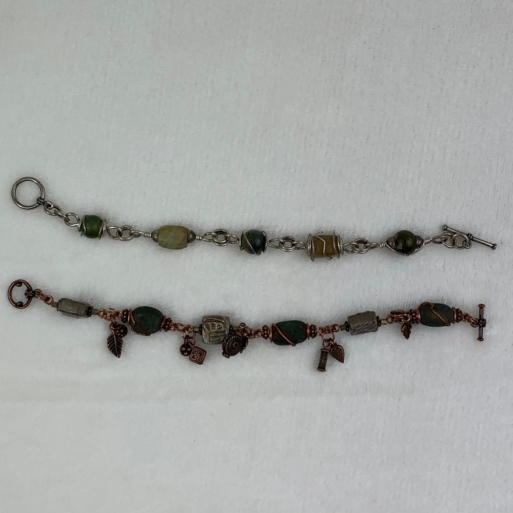 Two metal and bead bracelets